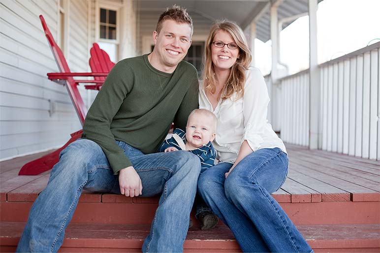 Family sitting on a porch